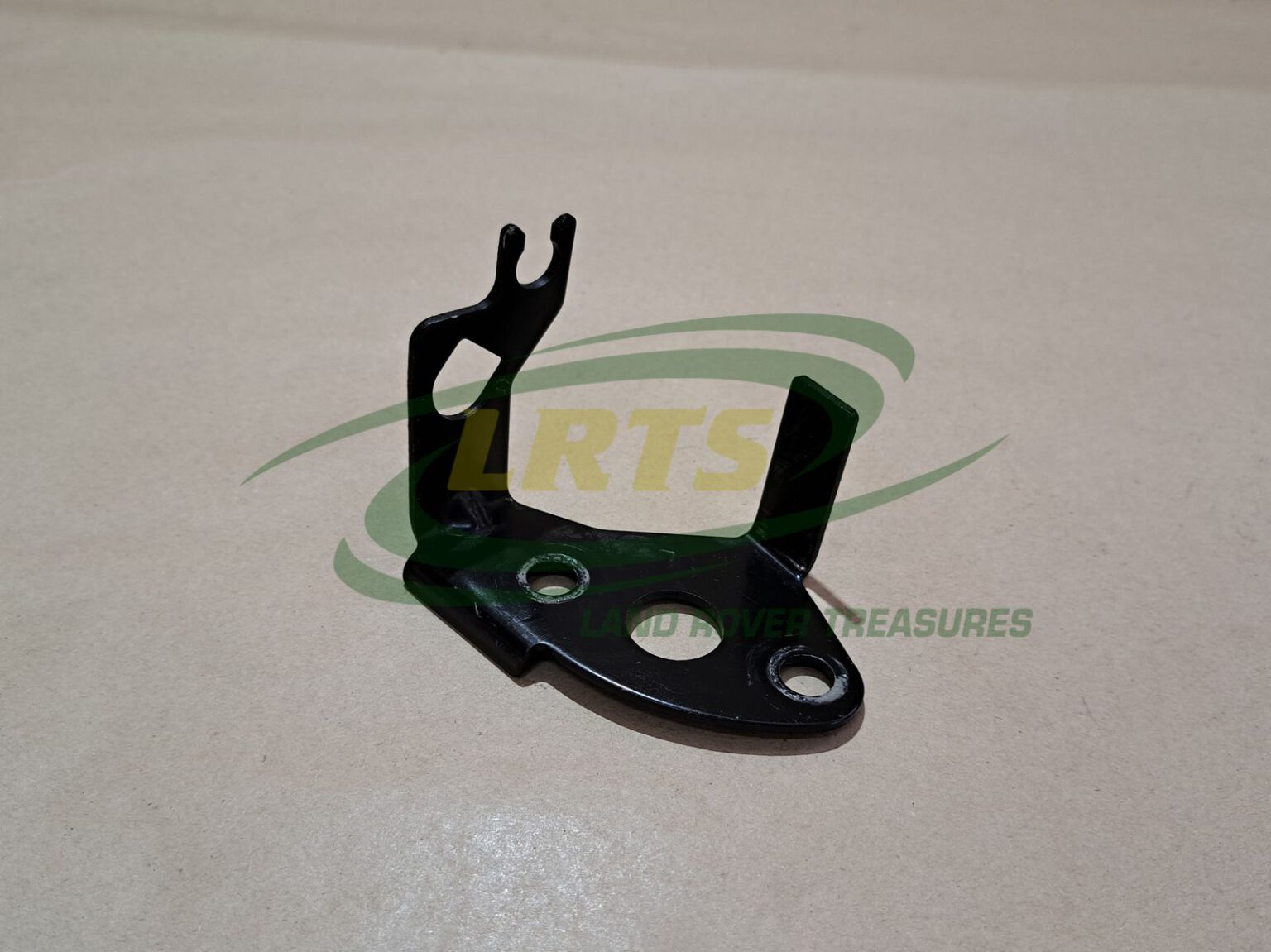 SHU000050 BRACKET LH SWIVEL BRAKE PIPE LAND ROVER DEF Land Rover Treasure Shop